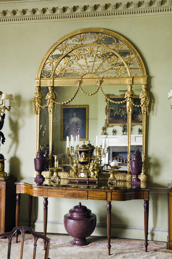 A giltwood pier glass in the Dining Room at Hinton Ampner, Hampshire