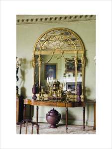 A giltwood pier glass in the Dining Room at Hinton Ampner, Hampshire