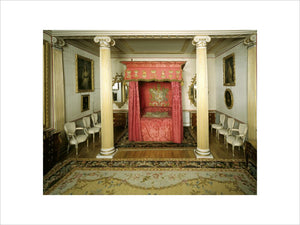 The State Bedroom at Blickling showing bed with red hangings and carpet