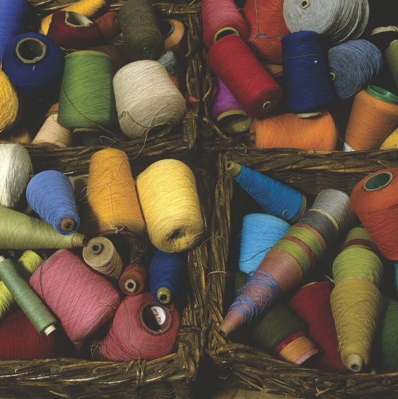 Colourful cotton reels in baskets at Styal Estate