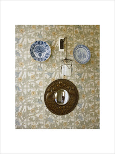 Plates against the William Morris "Trellis" wallpaper in the Morning Room corridor at Standen, West Sussex