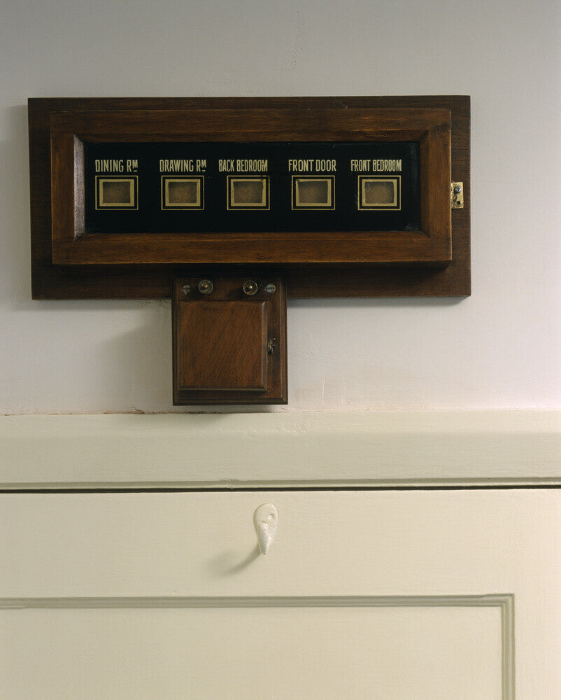 The electric bellboard above the door in the Morning Room at Mendips ...