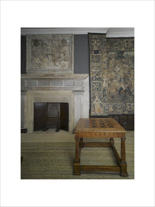 A marquetry topped games table, English c.1580, in the Withdrawing Chamber at Hardwick Hall, Derbyshire.
