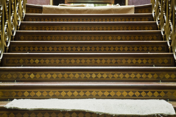 The Staircase off the Picture Gallery with the old carpet removed at Attingham Park, Shropshire